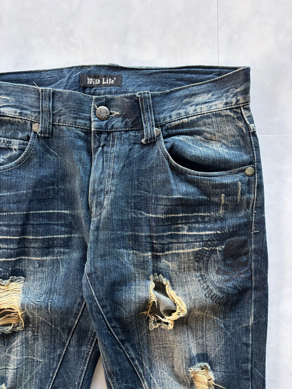 unknown uk skull destroyed flare denim