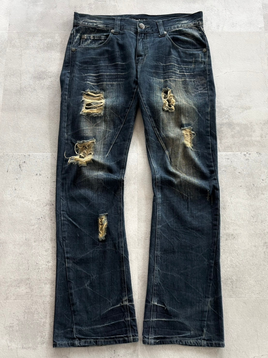 unknown uk skull destroyed flare denim