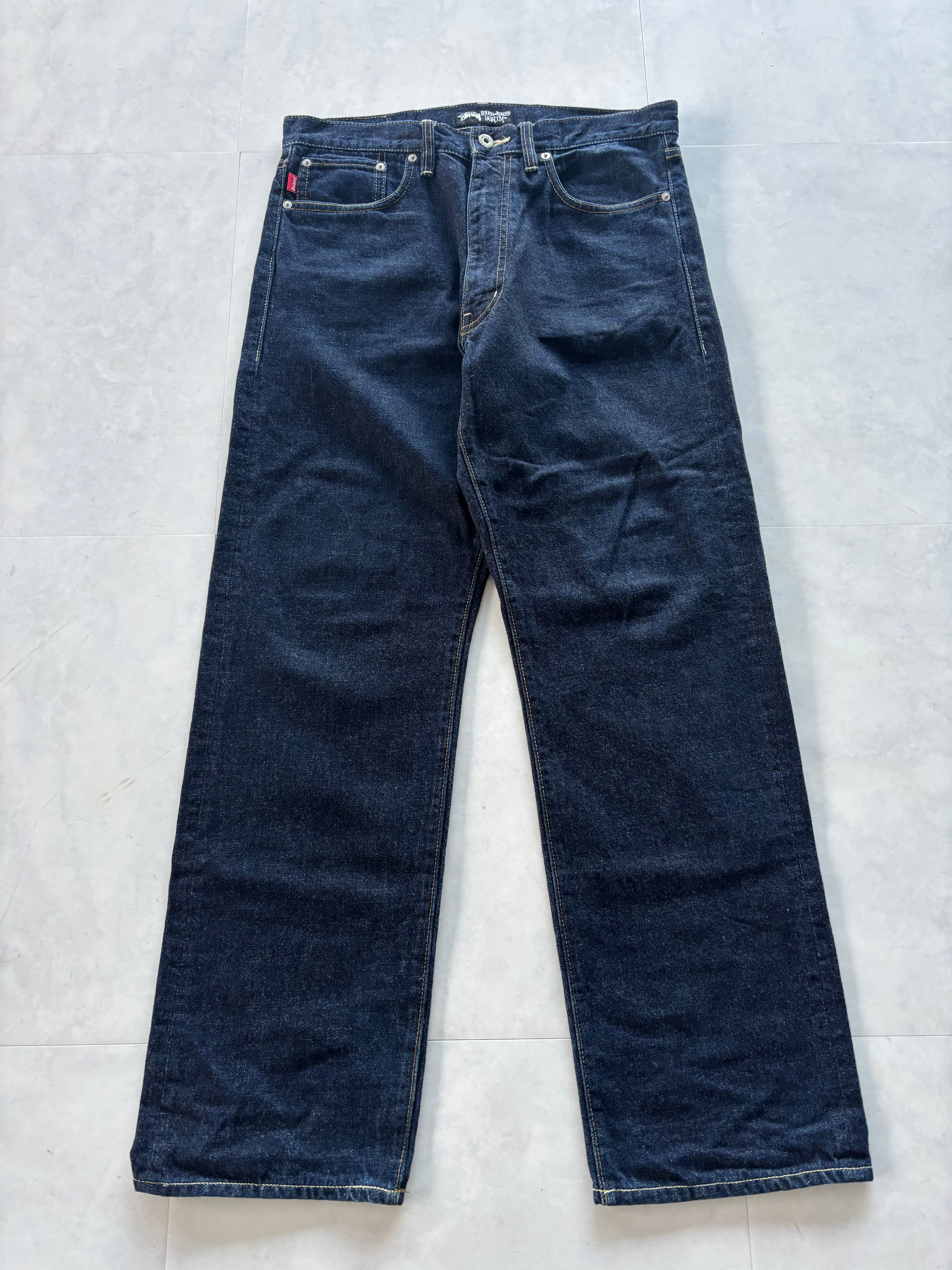 STUSSY Back Paint Logo Jeans