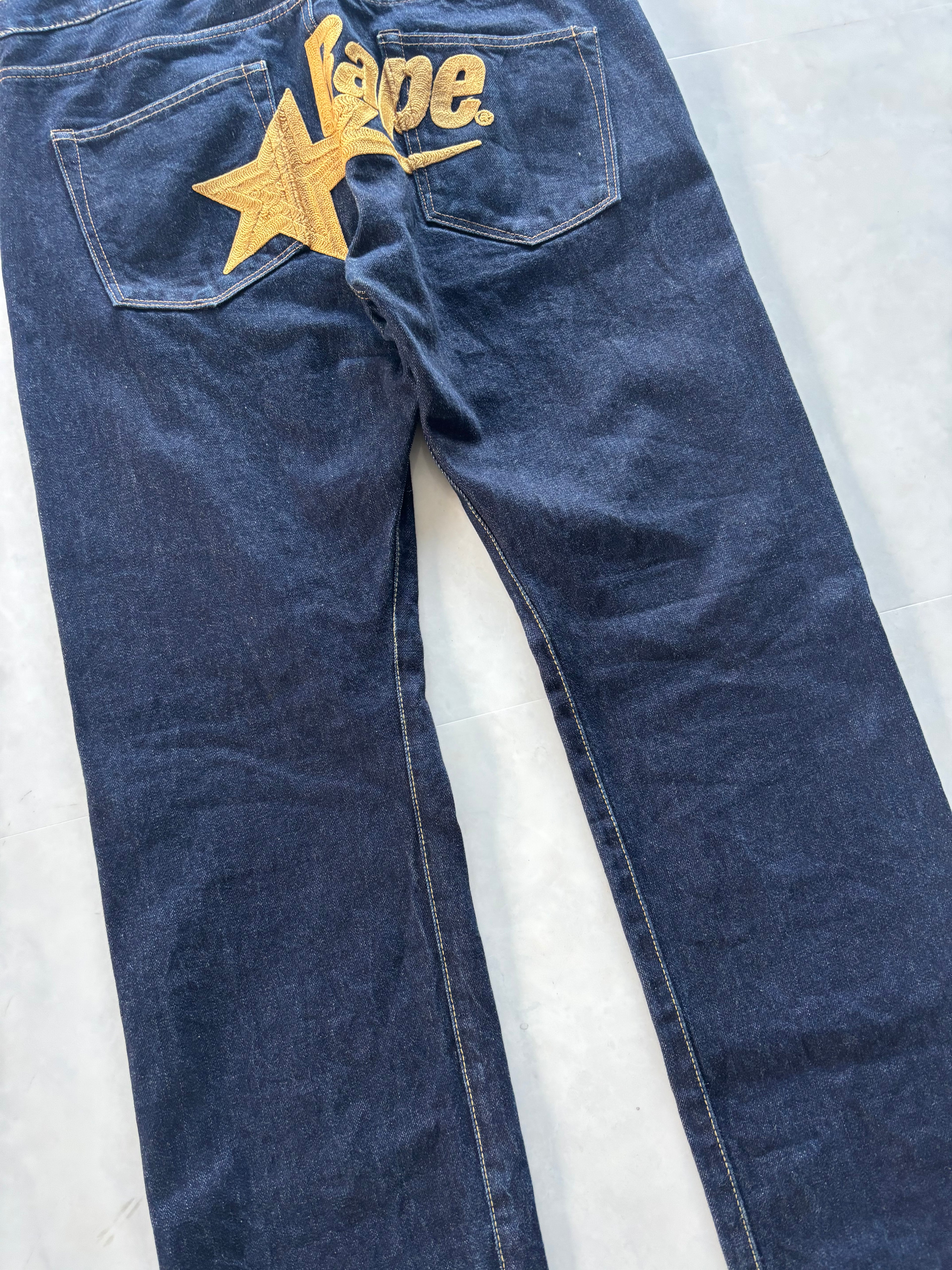 A BATHING APE Gold Star Logo Denim