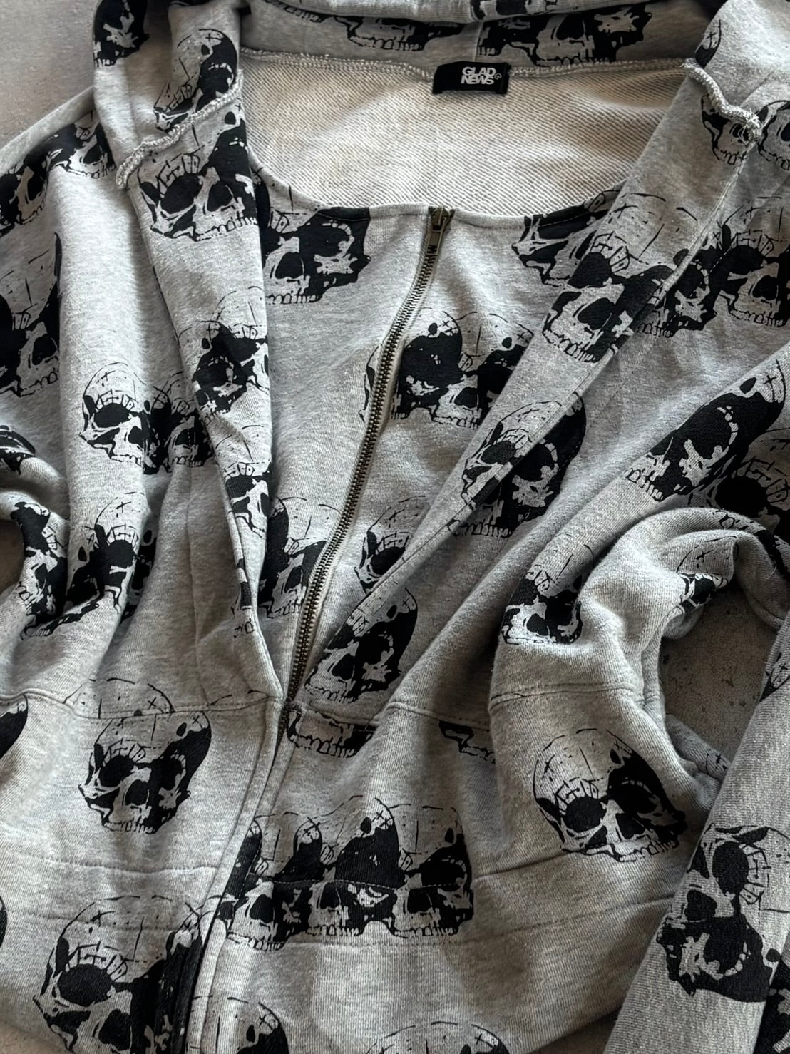 GLAD NEWS All-Over Skull Zip Hoodie
