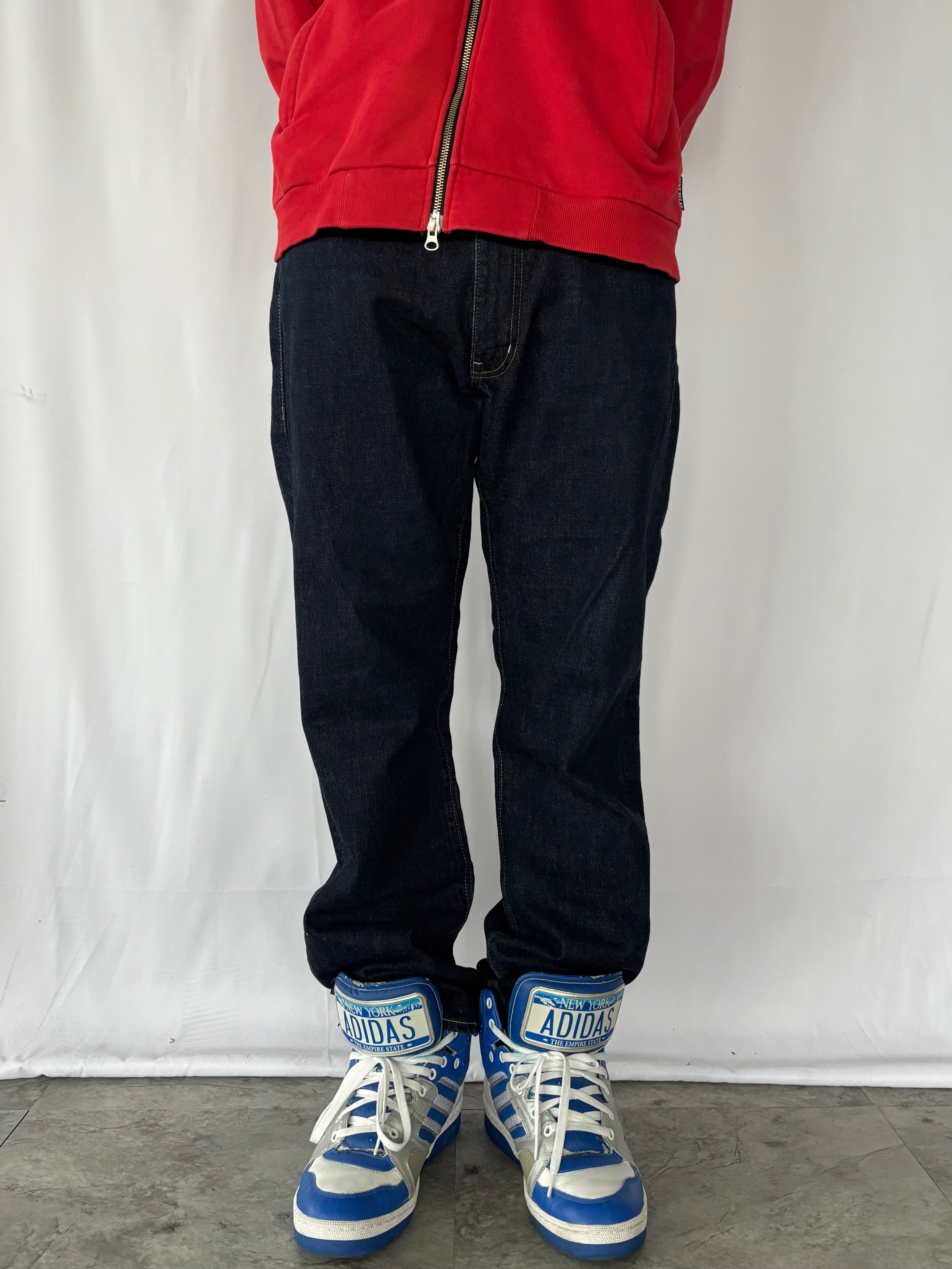 STUSSY Back Paint Logo Jeans