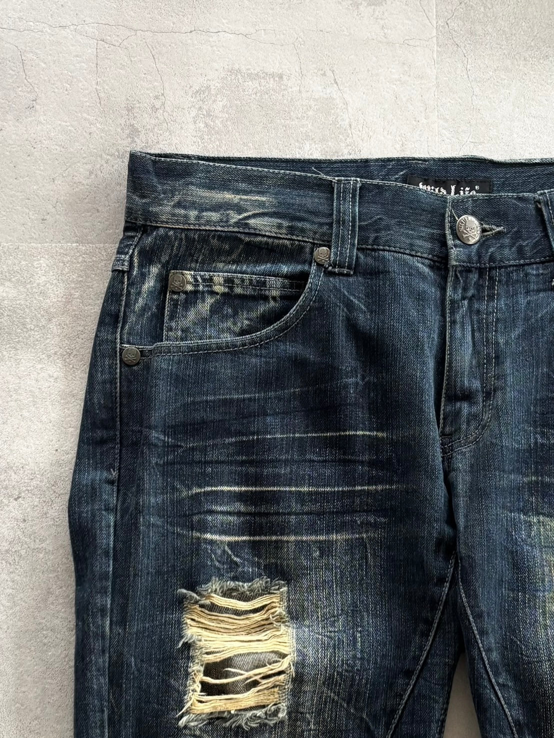 unknown uk skull destroyed flare denim