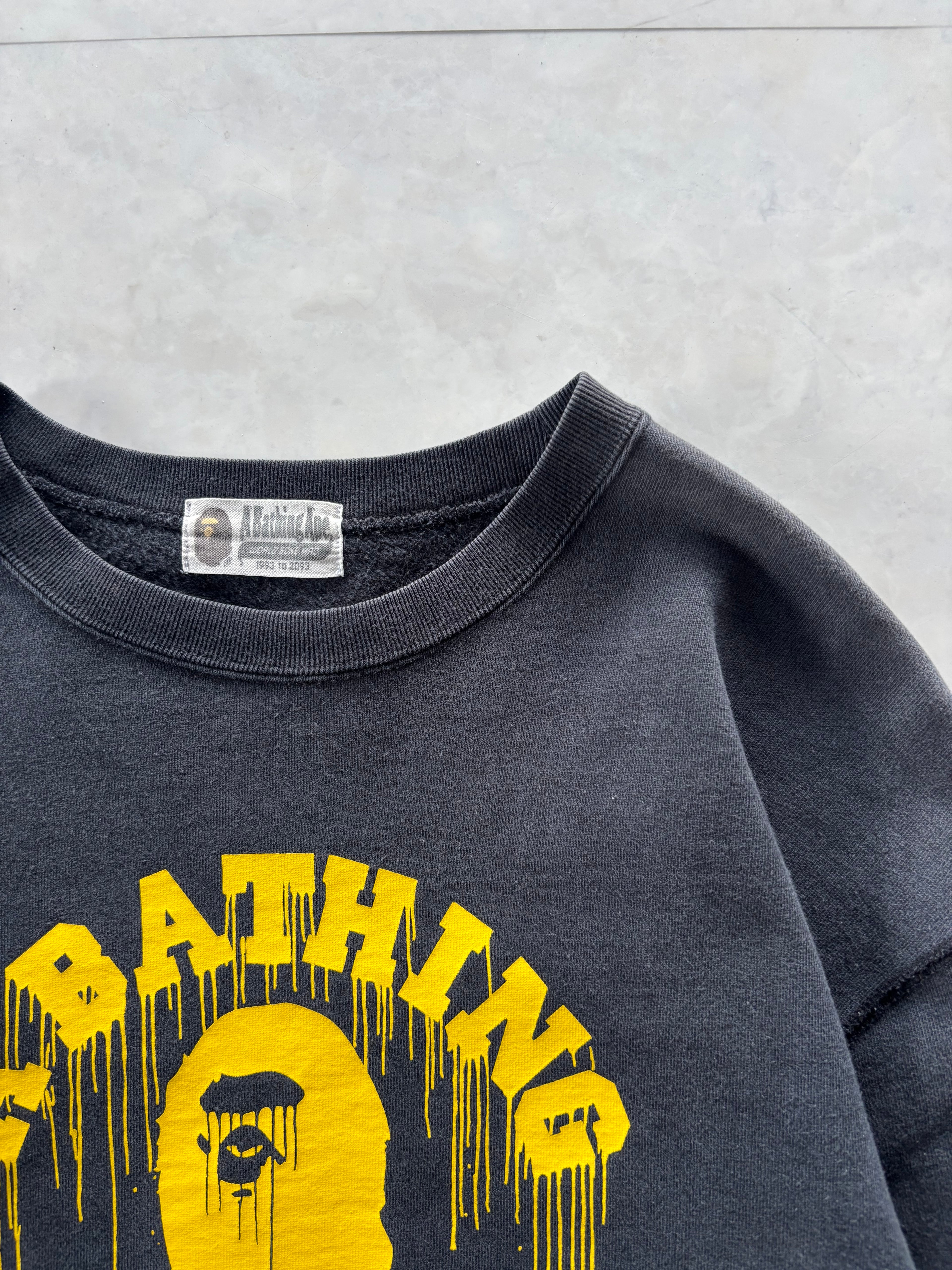 A BATHING APE® Yellow Drip Logo Crewneck