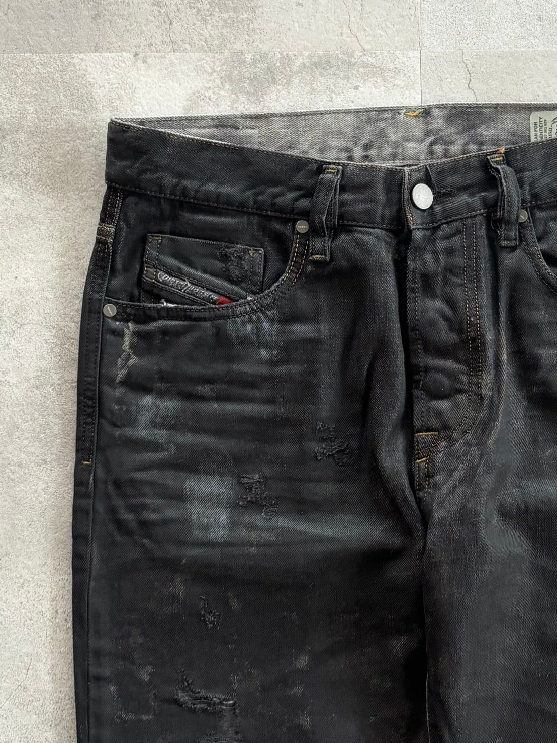 DIESEL Waxed Distressed Denim Pants