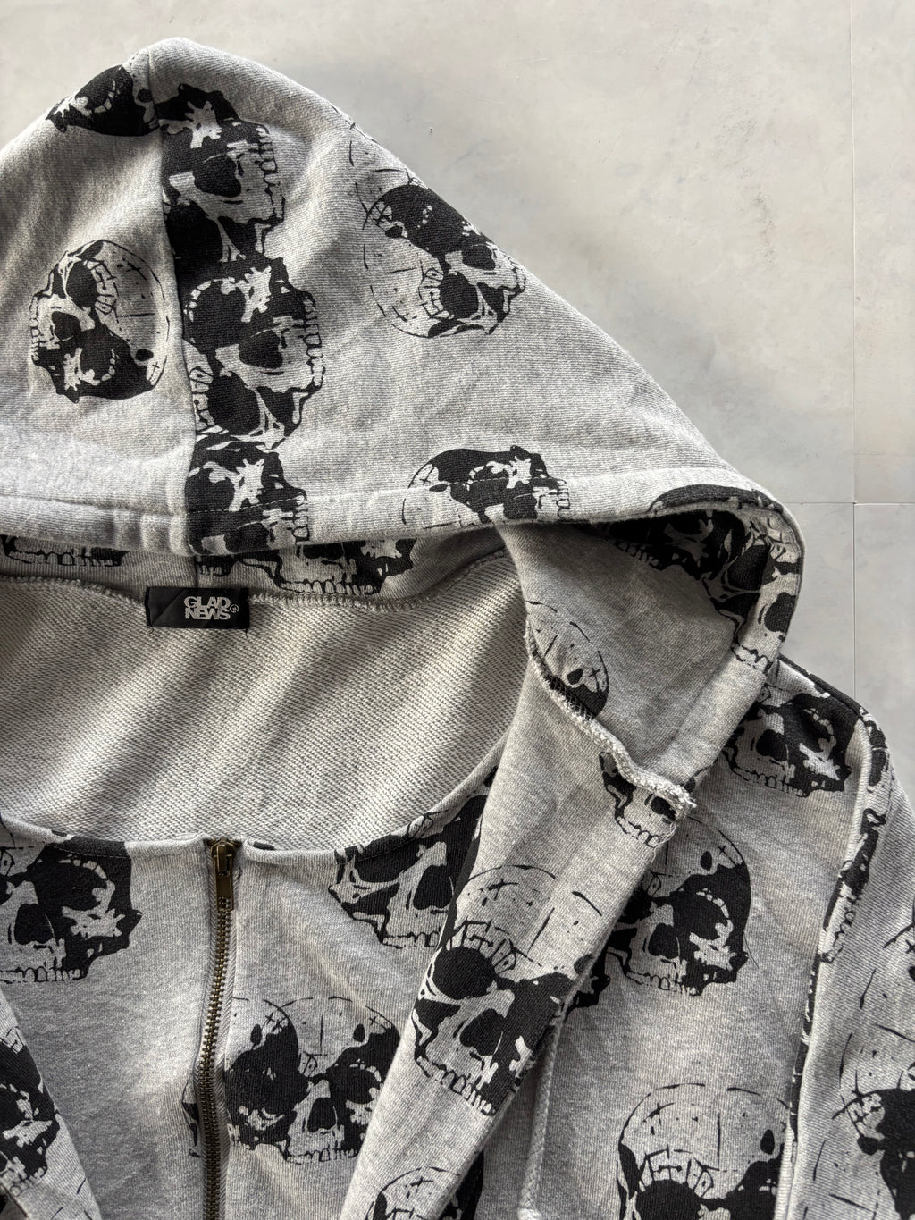 GLAD NEWS All-Over Skull Zip Hoodie