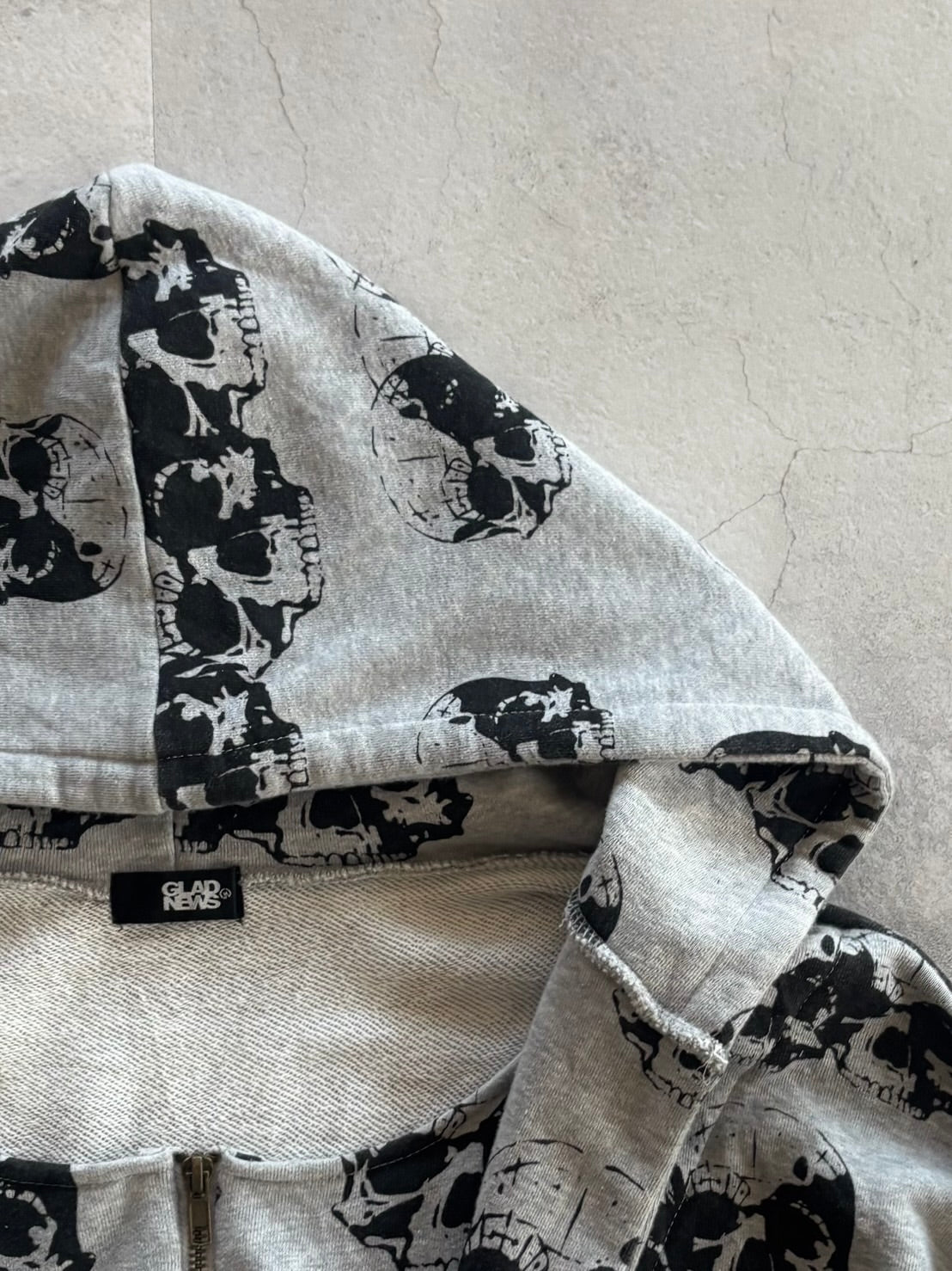 GLAD NEWS All-Over Skull Zip Hoodie