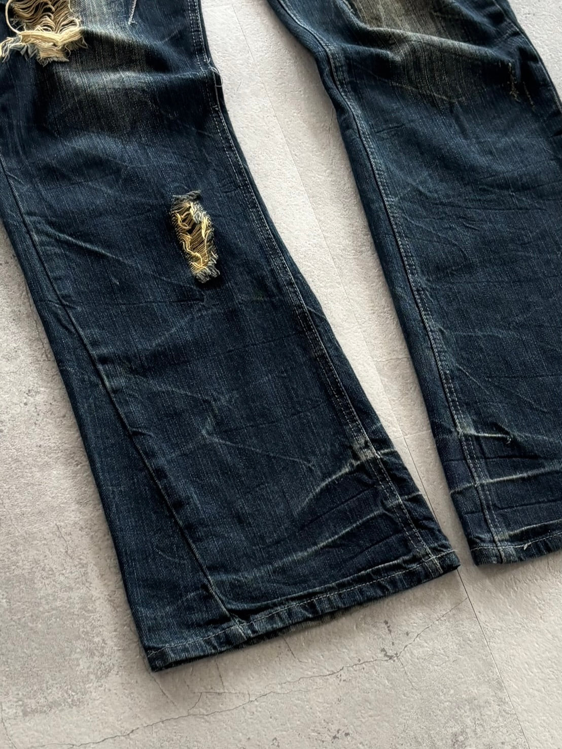 unknown uk skull destroyed flare denim
