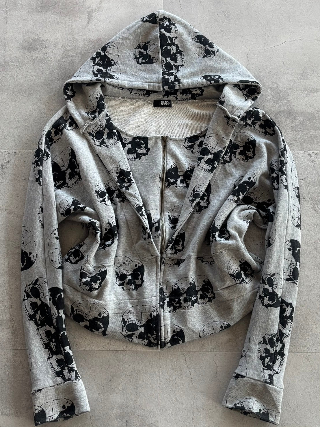 GLAD NEWS All-Over Skull Zip Hoodie