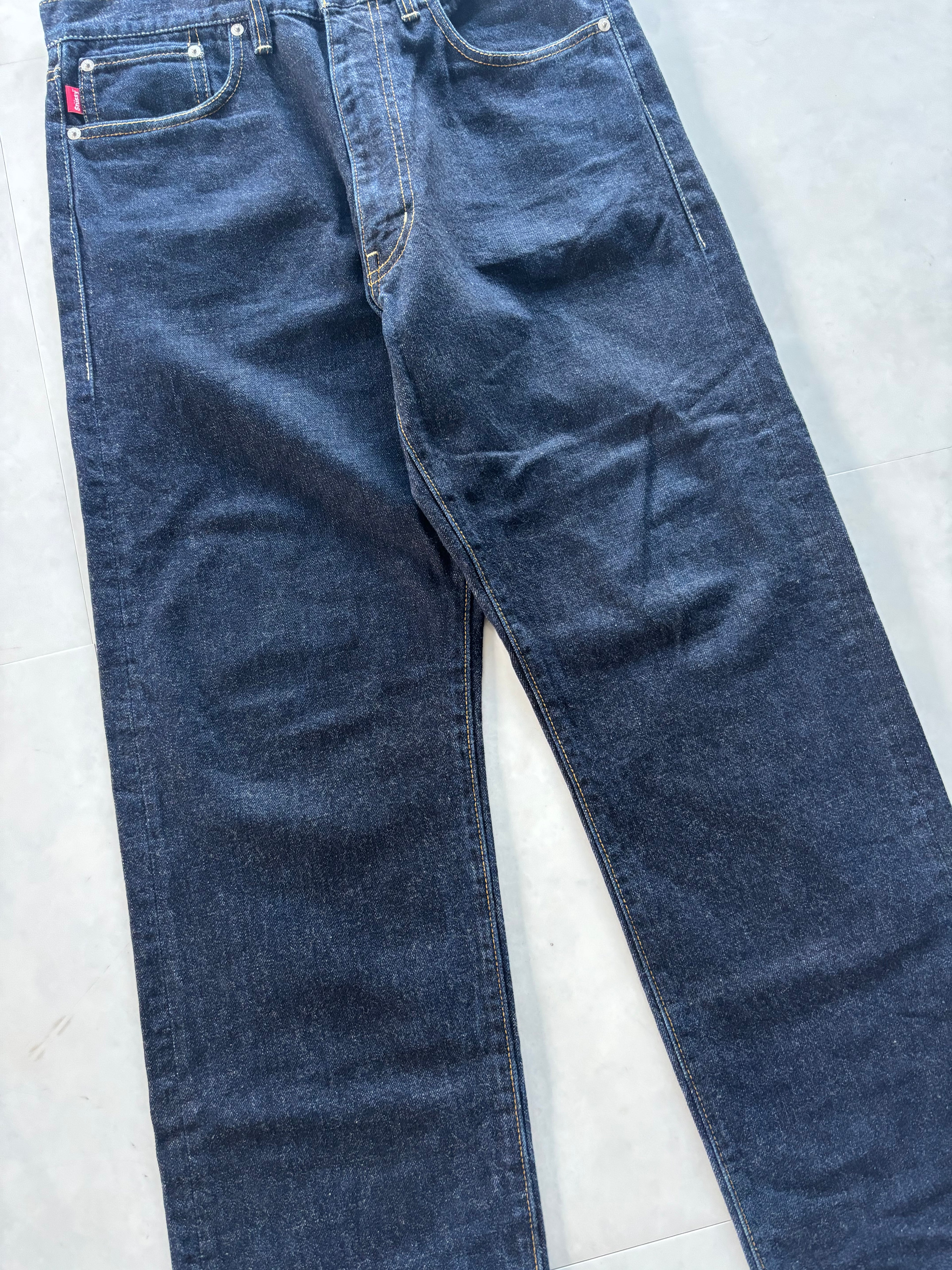 STUSSY Back Paint Logo Jeans