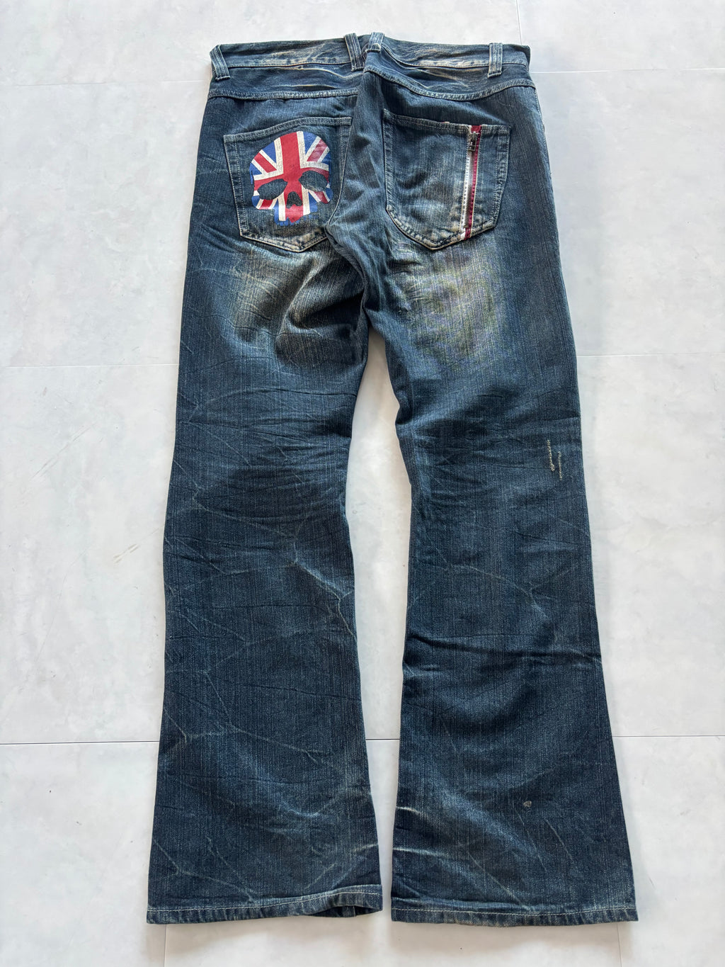 unknown uk skull destroyed flare denim